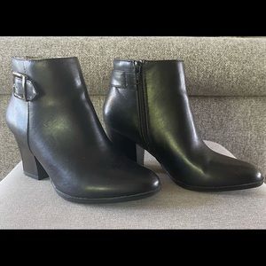 Barely worn, black ankle boots with decorative side buckle.